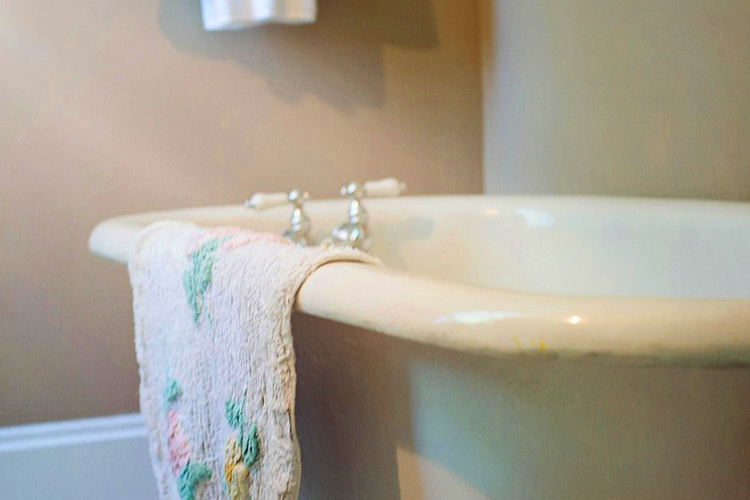 cappella of grand junction bathroom tub with towel
