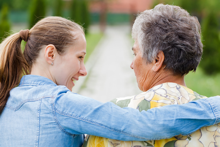 cappella of grand junction woman talking with senior mother