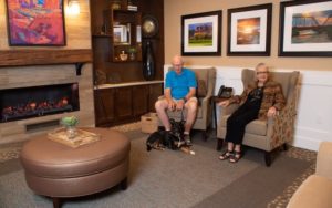 Residents Relaxing by the Fire