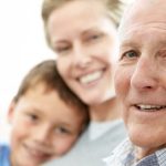 older man with daughter and grandchild