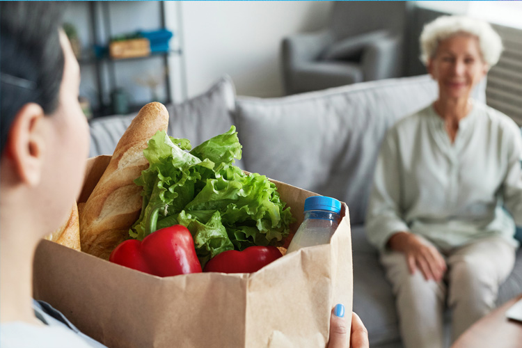 cappella of grand junction taking caregiver bringing groceries in