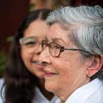 cappella grand junction senior woman profile with granddaughter behind her