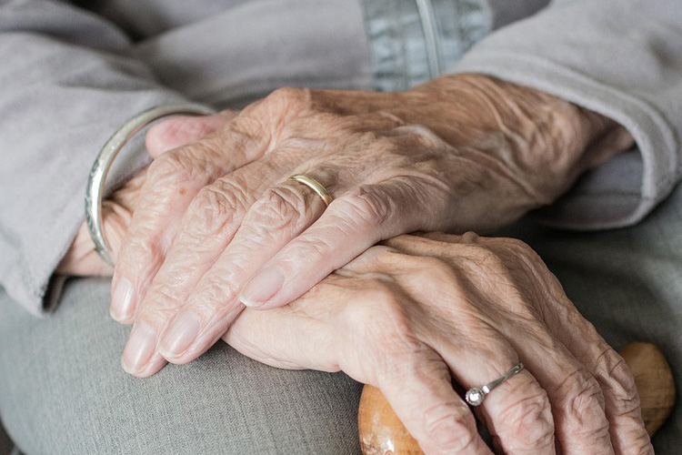 cappella of grand junction senior woman folded hands