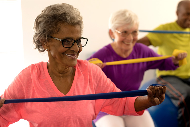 cappella of grand junction senior woman exercising with other residents cappella of grand junction senior woman exercising with other residents